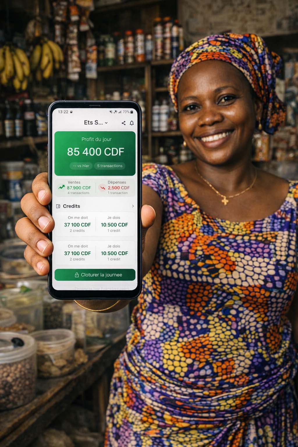 Vendeuse utilisant Mosungi dans sa boutique à Kinshasa